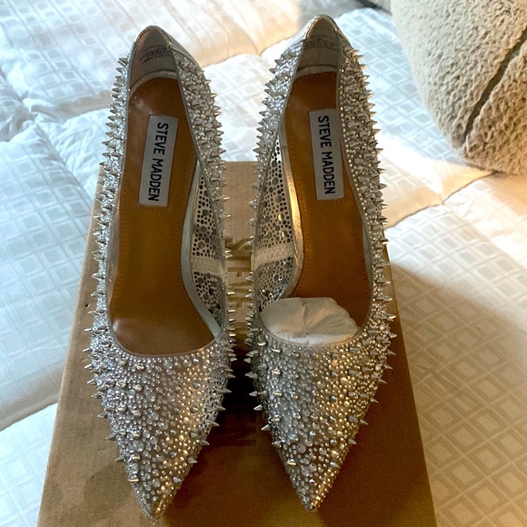 Steve Madden Shoes - Brand new in box Steve Madden (Clear) spiked pumps. Size 7.5